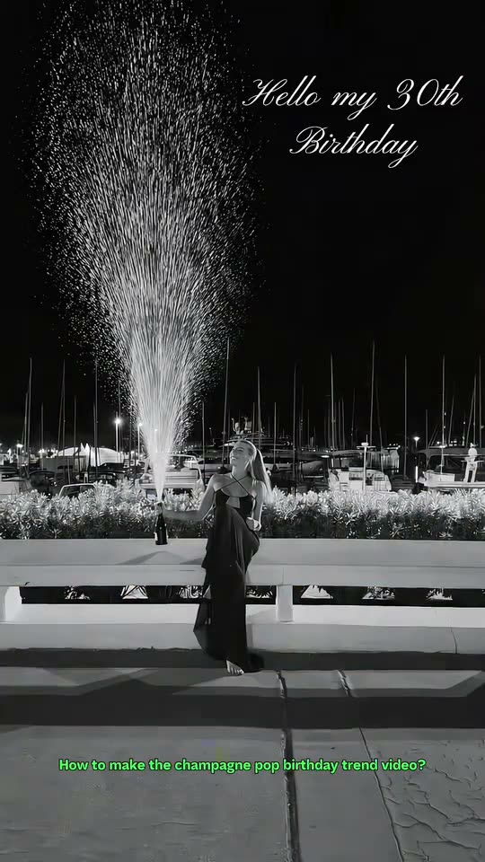 Birthday champagne pop: a woman on a sunny terrace sprays champagne, a blurred spin into the night