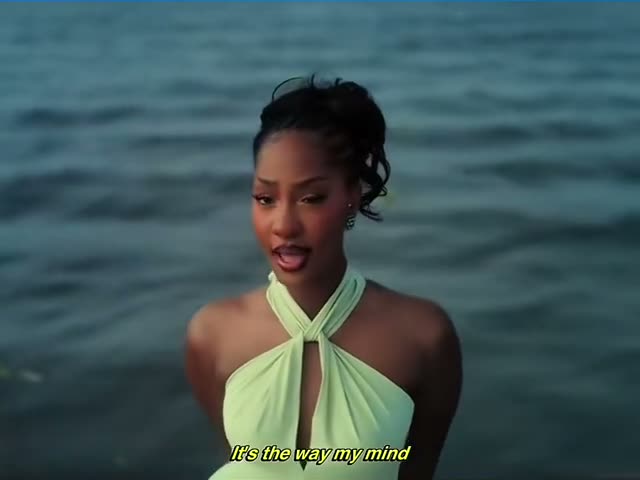 Tems singing in the “Raindance” music video, the scene the AI versions recast